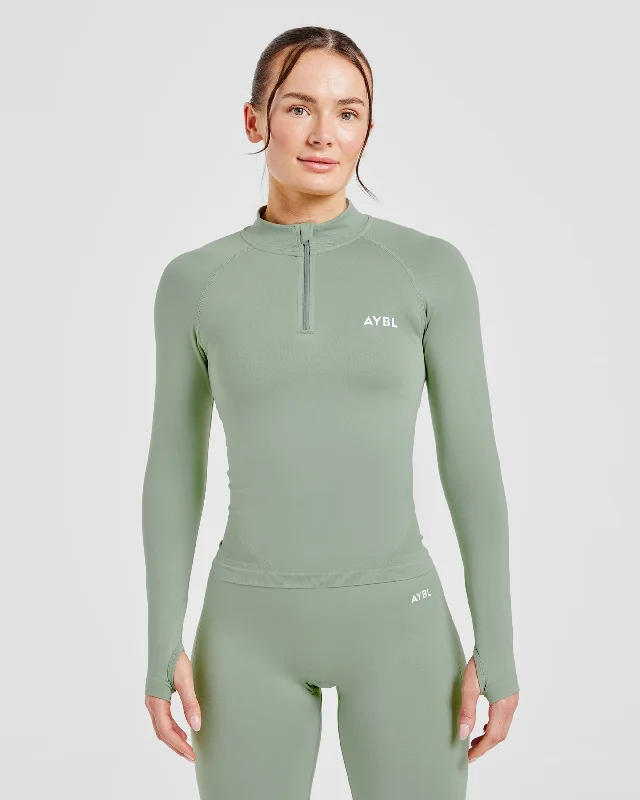 Empower Seamless 1/2 Zip Jacket - Grove Grün Appliqued Jacket Beaded Jacket Sequined Jacket Empower Seamless 1/2 Zip Jacket - Grove Grün Appliqued Jacket Beaded Jacket Sequined Jacket
