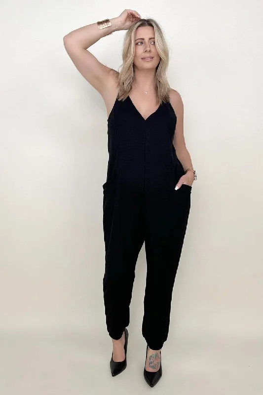 Textured Black Sleeveless V-Neck Pocketed Jumpsuit Casual jumpsuit, Relaxed fit, Summer style, Trendy Textured Black Sleeveless V-Neck Pocketed Jumpsuit Casual jumpsuit, Relaxed fit, Summer style, Trendy