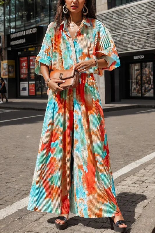 Tie-Dye Half Button Collared Neck Jumpsuit High-waisted jumpsuit, Sleek, Comfortable, Summer style Tie-Dye Half Button Collared Neck Jumpsuit High-waisted jumpsuit, Sleek, Comfortable, Summer style